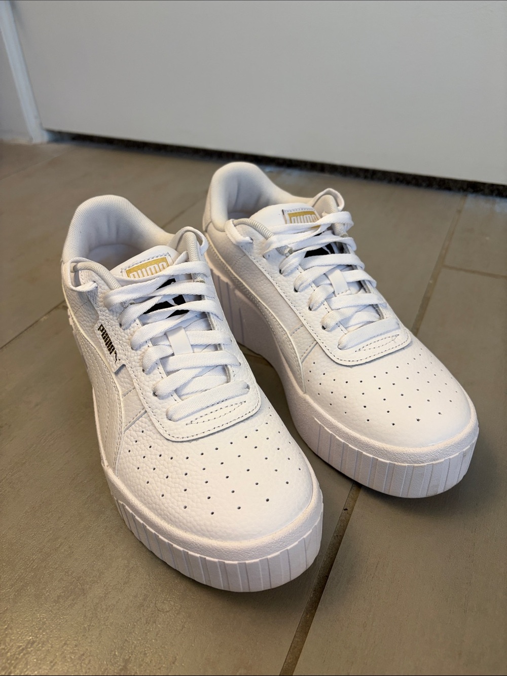 Puma White Chunky Platform Sneakers with Gold Logo